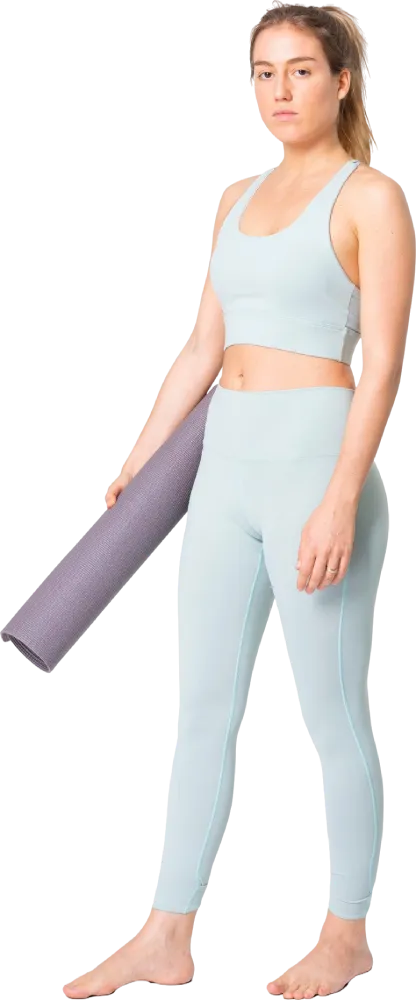 blonde-woman-holding-yoga-mat-blue-sports-bra-leggings-full-body